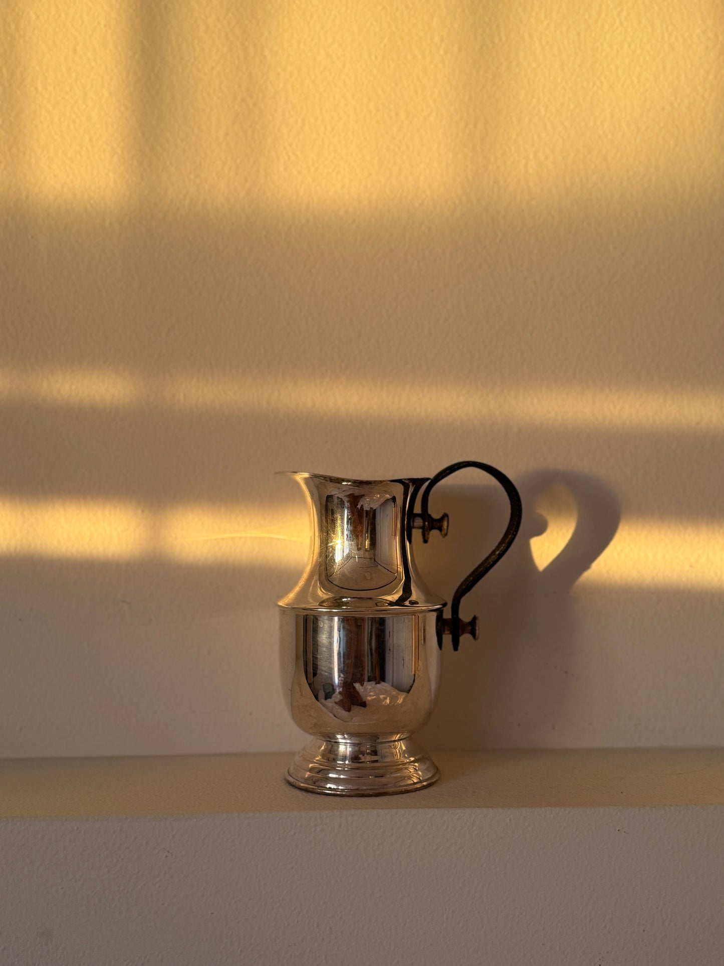 Silver & Leather Pitcher